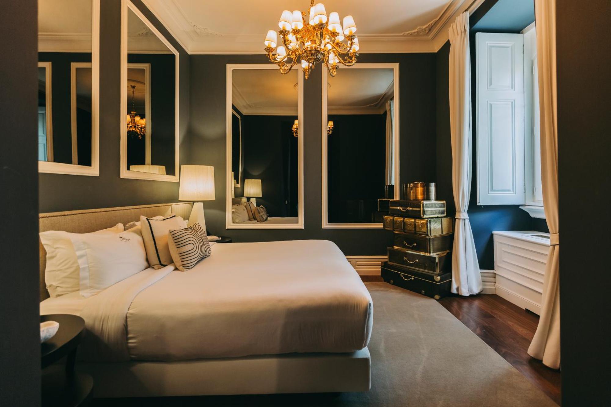 Torel Palace Lisboa Стая снимка A bedroom at the hotel