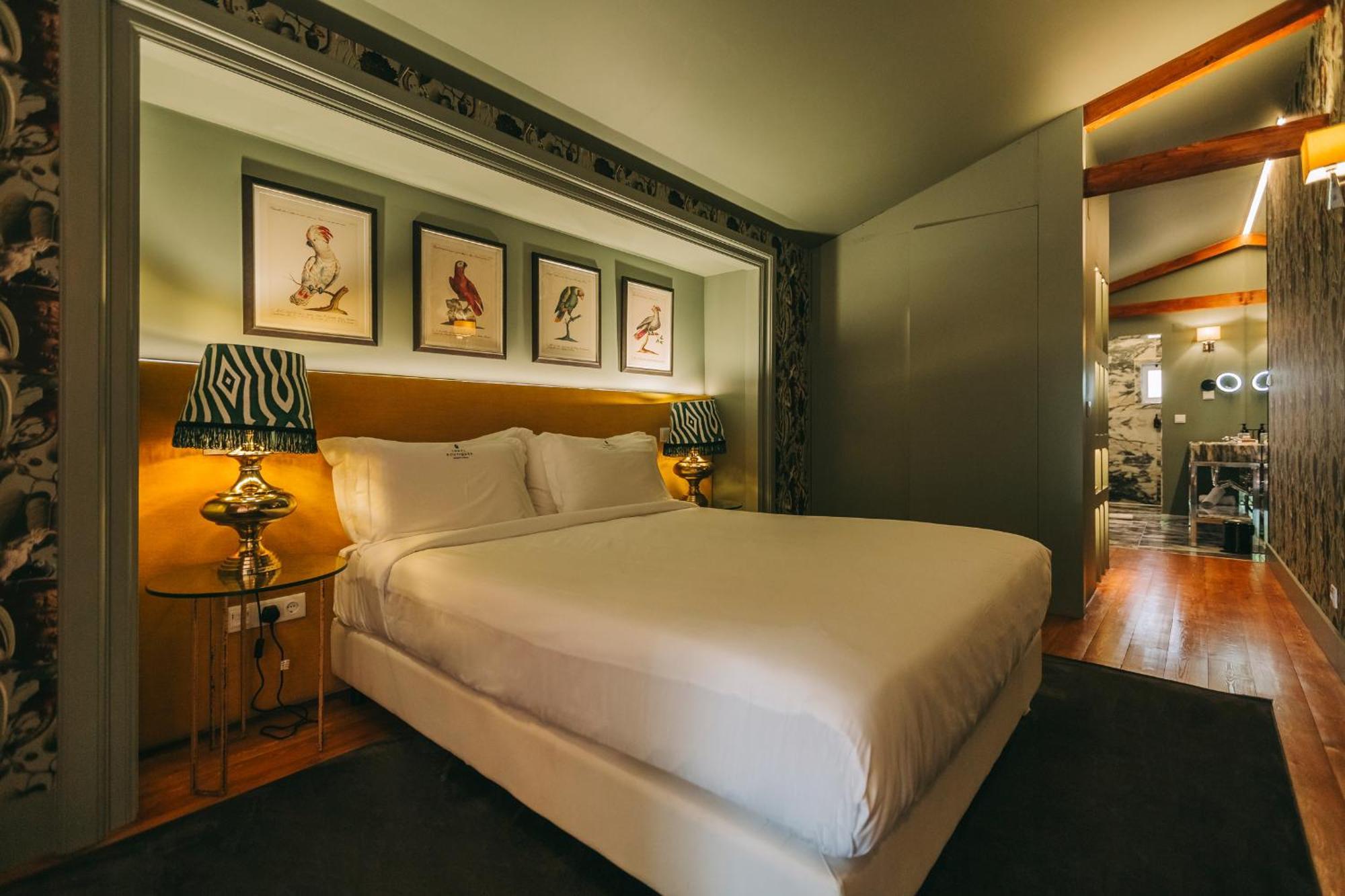 Torel Palace Lisboa Стая снимка A bedroom at the hotel